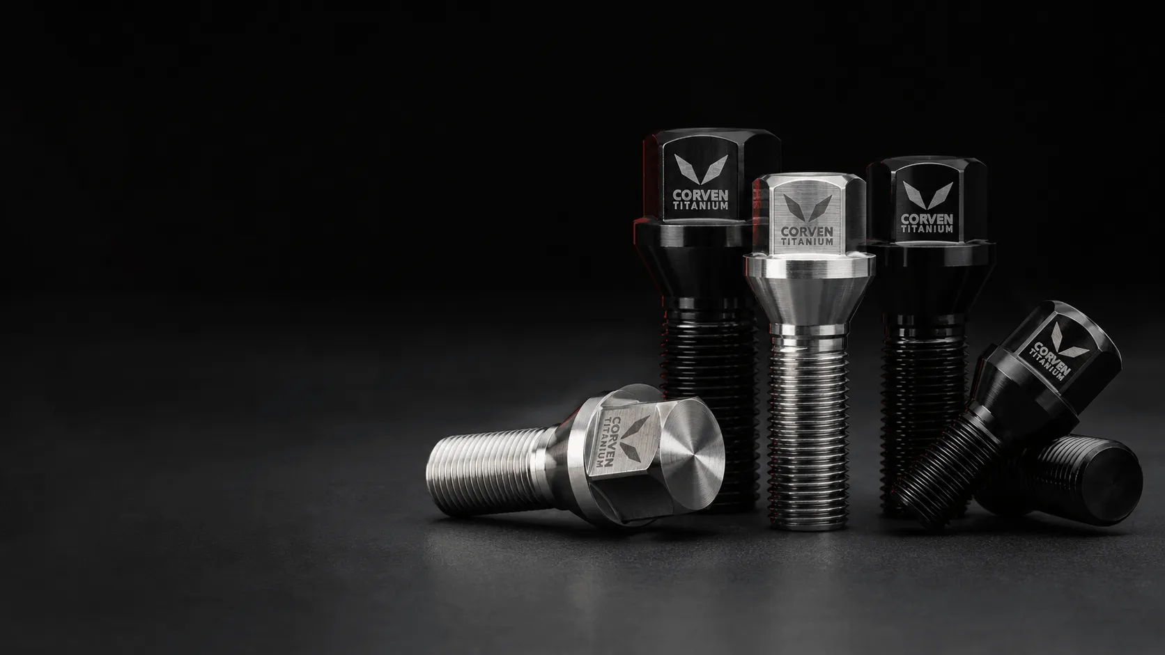 Black and silver CORVEN Ti-6Al-4V titanium wheel bolts